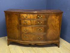 A C20th flame mahogany veneer bow fronted side unit of 4 long drawers and two cupboards, 132cmW x