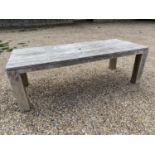A good solid heavy rustic teak garden plank top table., with parasol hole, general wear and some