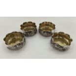 Four Turkish silver rose bowls, with flared rims and applied decoration, gilt interiors, stamped