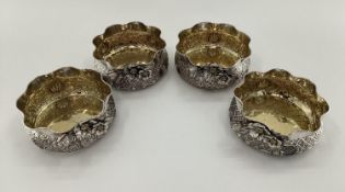 Four Turkish silver rose bowls, with flared rims and applied decoration, gilt interiors, stamped