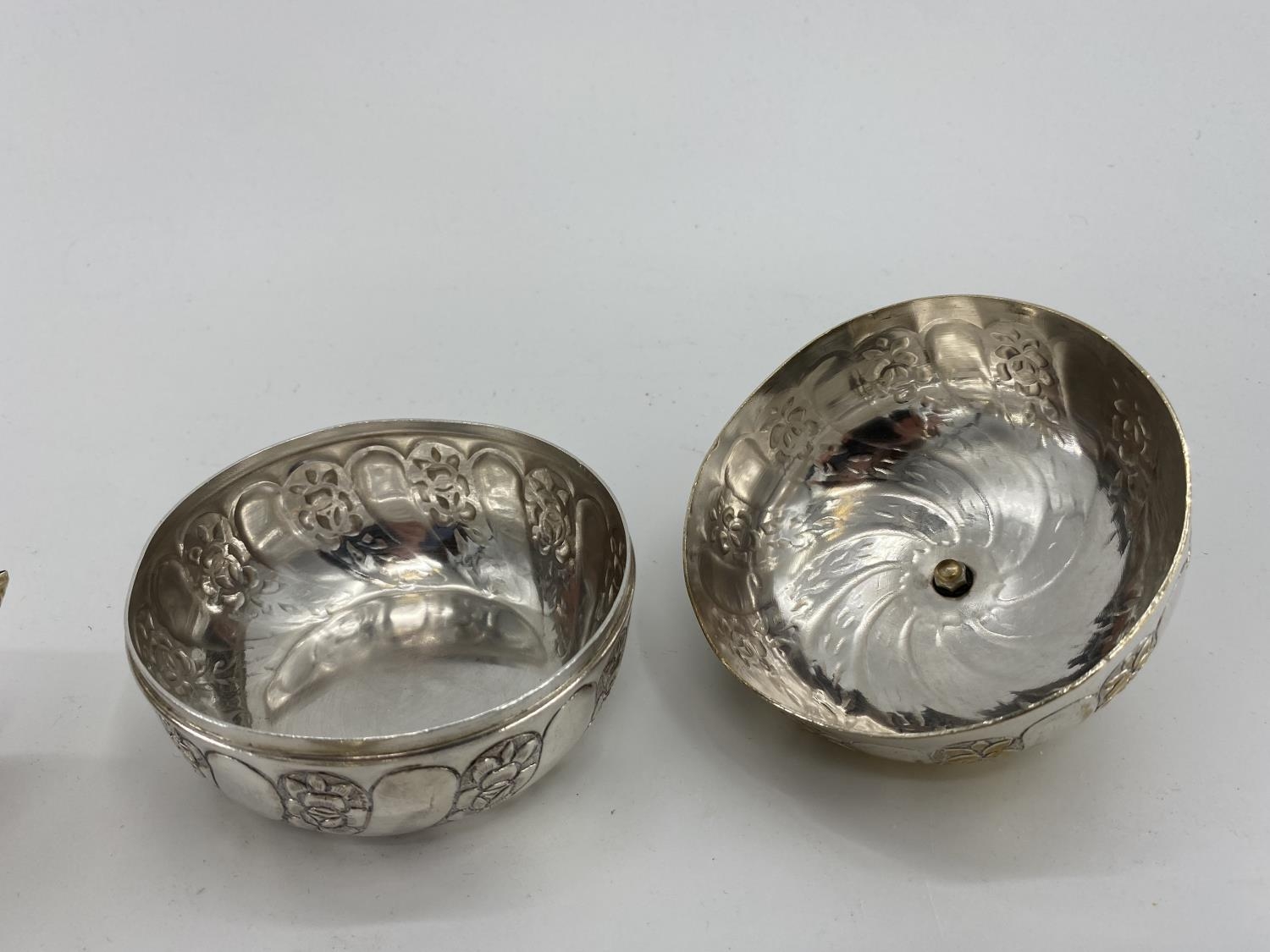 A pair of white metal egg cups in the form of cast chickens with gilt interiors, and a white metal - Image 3 of 5