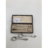 A pair of boxed sterling silver forks set with Scottish hardstones together with a pair of white