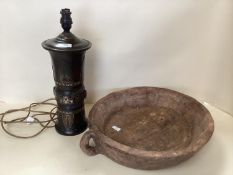 A large rustic wooden bowl, and a table lamp with Champleve decoration