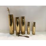 A collection of brass WW1 shell casings, and other small brass items. Largest 35cm H