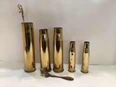 A collection of brass WW1 shell casings, and other small brass items. Largest 35cm H