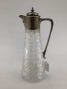 Cut glass and white metal claret jug with star base and etched Victoria Jubilee armorial, 1887, 29cm