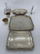 A collection of silver plated items to include trays, toast rack and boxed cutlery