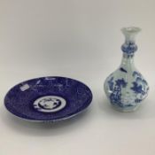 A Chinese blue and white octagonal vase, some wear, and restoration, and a decorative blue and white