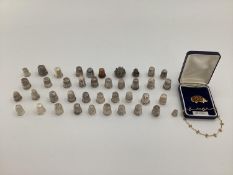 Large collection of mainly sterling silver and unmarked white metal thimbles, various makers and
