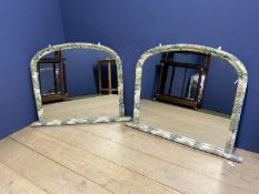 A pair of Victorian overmantel mirrors, arched plate with later converted fabric frame, 95 x 120cm