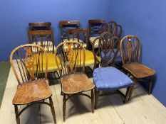 Set of four Regency mahogany dining chairs (3 + carver), upholstered with overstuffed striped silk