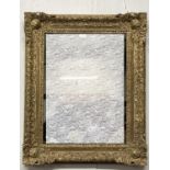 A carved giltwood mirror, rectangular plate with carved floral frame, 83 x 66cm