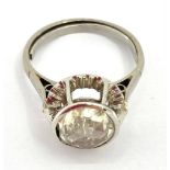 Continental platinum and diamond single stone ring, in pierced halo setting, single rose cut