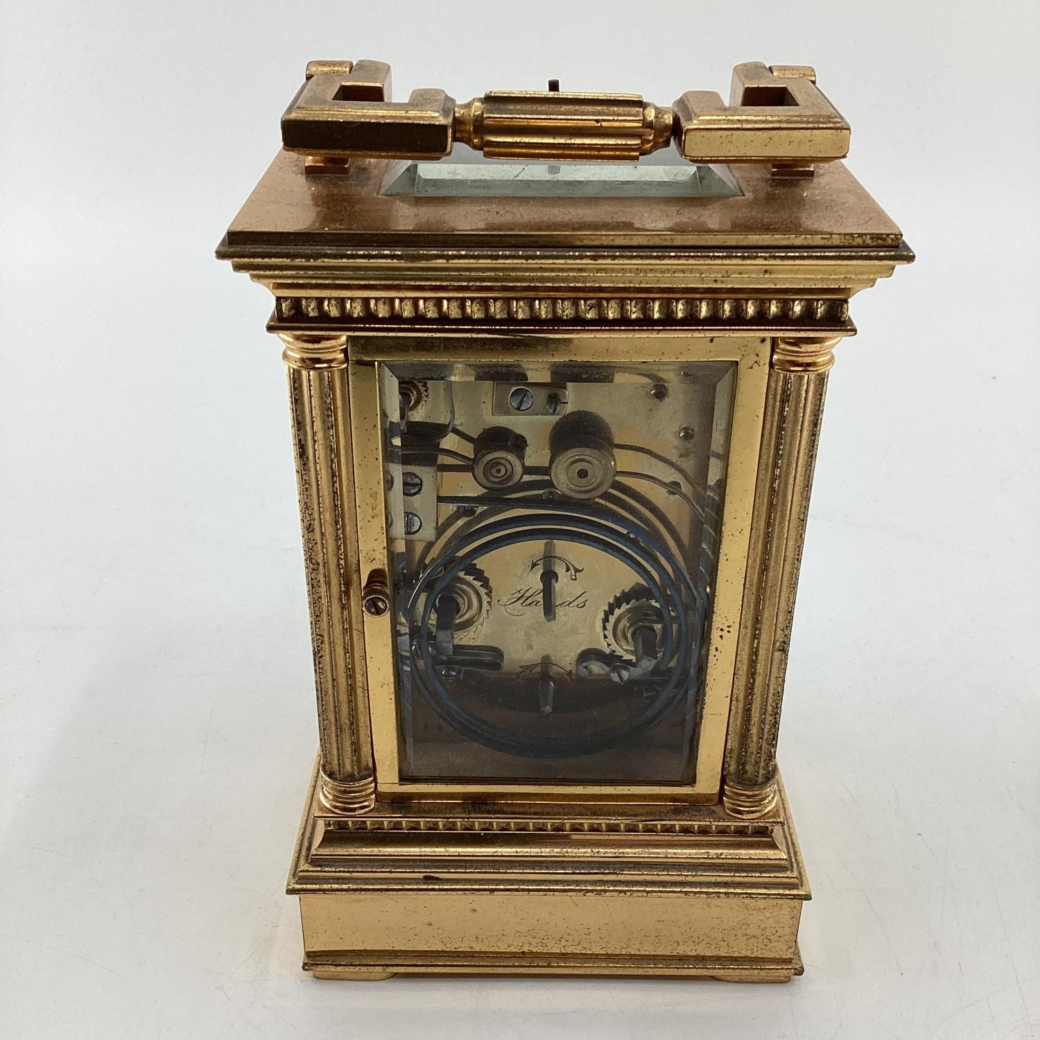 A gilt brass carriage clock, with five glass panels, striking on a gong. - Image 4 of 7