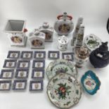 A quantity of modern decorative China to include armorial style vases, ginger jars and moon flask;