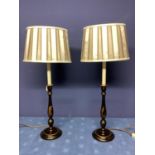 Pair of tall narrow black and chinoiserie Chinese style lamps , with cream and brown plated silk