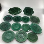 A quantity of green lustre Wedgwood and other plates and dishes