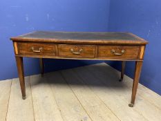 A good mahogany writing table, with 3 drawers, below a tooled green leather skiver, on brass