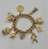 9ct gold curb link charm bracelet set throughout with 9ct gold and 2 unmarked yellow metal charms,