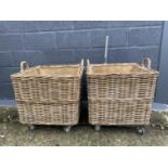 Pair of log baskets on wheels