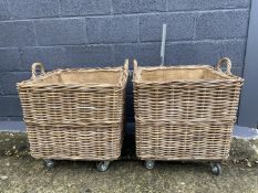 Pair of log baskets on wheels