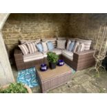 GARDEN FURNITURE: A large garden L shaped sofa and brown striped cushion set, with small matching