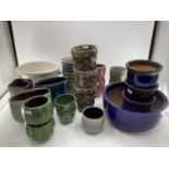 A quantity of decorative flower pots, planters all modern, as found