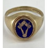 A 9ct gold masonic signet ring with flip top panel revealing blue enamel compass and set square 3.8g