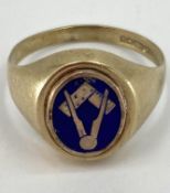 A 9ct gold masonic signet ring with flip top panel revealing blue enamel compass and set square 3.8g