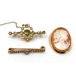 An 18ct gold peridot and split pearl set brooch and a 9ct bar brooch set with aquamarine and pearl