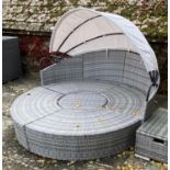 GARDEN FURNITURE: Two similar grey faux rattan/all weather semi circular garden sun sofas and