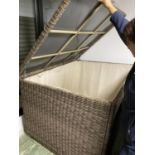 GARDEN FURNITURE: A large all weather outside garden lidded brown faux wicker chest - for garden