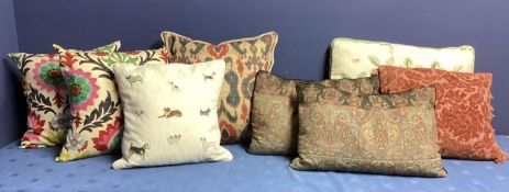 Eight various cushions, including a Chelsea Textile London dog patterned cushion, a pair of Sofa.com