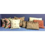 Eight various cushions, including a Chelsea Textile London dog patterned cushion, a pair of Sofa.com