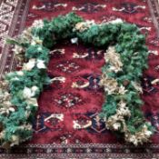 CHRISTMAS: Door garland, with white poinsettia, pine cones, and gold coloured holly etc approx