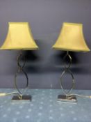 Pair of modern chrome style lamps, with square cream shades, some wear