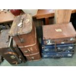 Vintage suitcases and trunks, including Globe Trotters, all with much wear, buy as seen