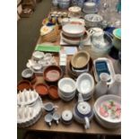 A quantity of good kitchen crockery and china and flan dishes, bowls, Pyrex bowls, decorative bowls,