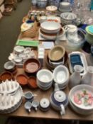 A quantity of good kitchen crockery and china and flan dishes, bowls, Pyrex bowls, decorative bowls,