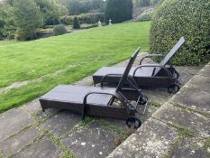 GARDEN FURNITURE: a pair of grey and black mesh garden recliners, and 4 steamer cushions as found