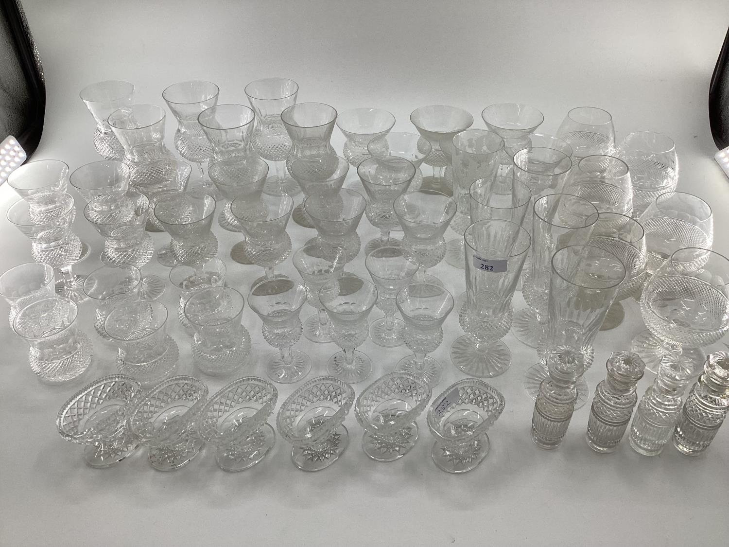 A quantity of glasswares to include wine glasses, of various sizes, and bowls etc