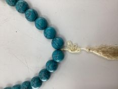 A large faux turquoise bead necklace