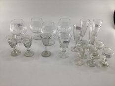 4 brandy balloons engraved racing scenes and 13 other port and sherry glasses