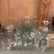 A large quantity of glassware's to include: candle holders, flower vases, large bowls, fruit bowls