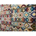 Two rugs, multi coloured patterned Carnival rugs, Turkey, polypropene, loose weave, 152 x 242cm