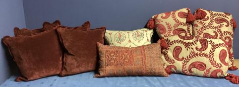 Seven cushions: to include a set of 3 Home Store oatmeal/linen coloured ground with velvet