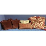 Seven cushions: to include a set of 3 Home Store oatmeal/linen coloured ground with velvet