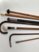 A quantity of walking canes and swagger sticks