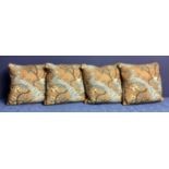 A set of four good cushions, decorated brown ground and blue exotic birds, and cream backs, see