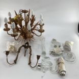 A brass style 8 branch ceiling chandelier, a wall sconce, and a glass chandelier, as found - some